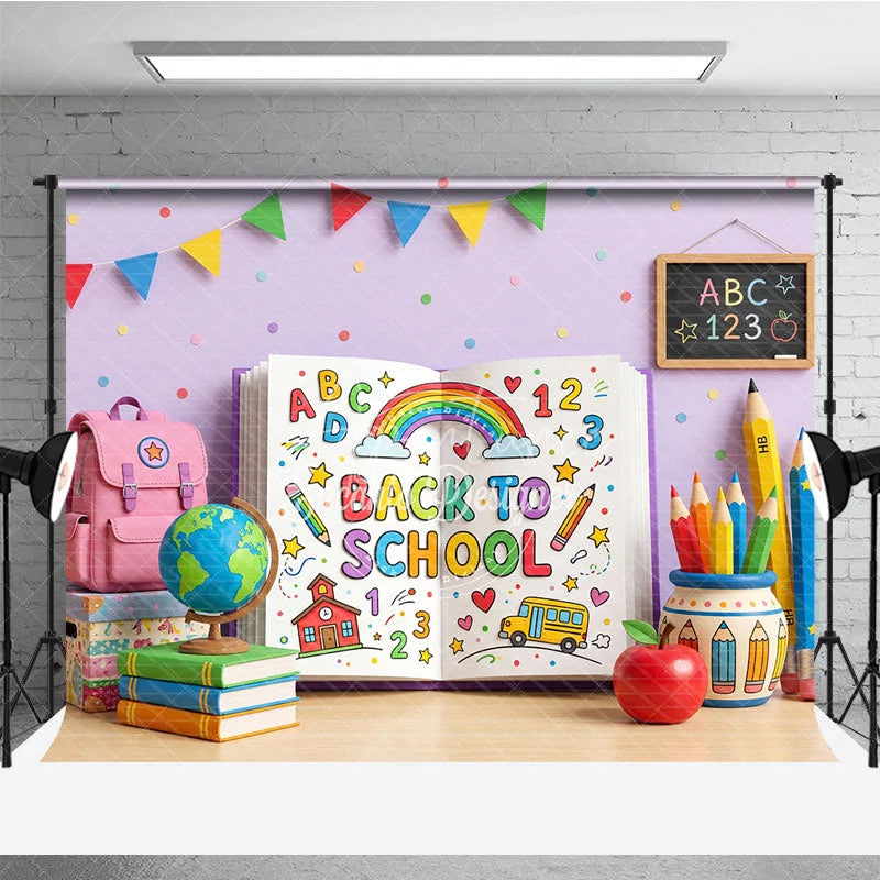 Aperturee - Aperturee Vibrant Back to School Photography Backdrop featuring a Colorful Open Book with Rainbow and School Supplies