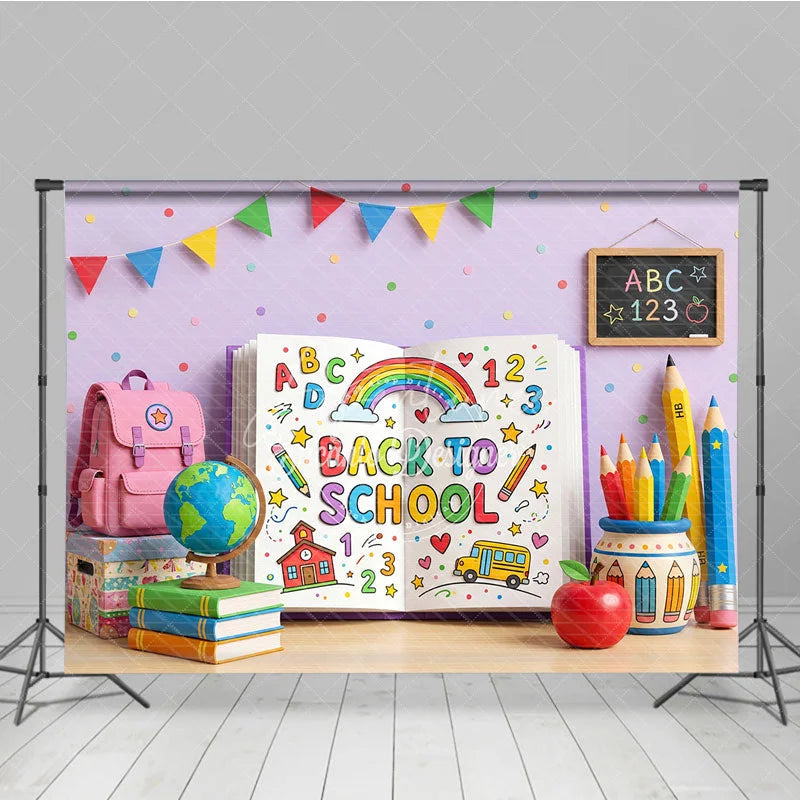 Aperturee - Aperturee Vibrant Back to School Photography Backdrop featuring a Colorful Open Book with Rainbow and School Supplies