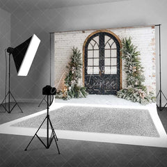 Aperturee - Aperturee Vintage Winter Door Backdrop Black Arched Grid Window Snowy Greenery White Brick Wall Photo Background
