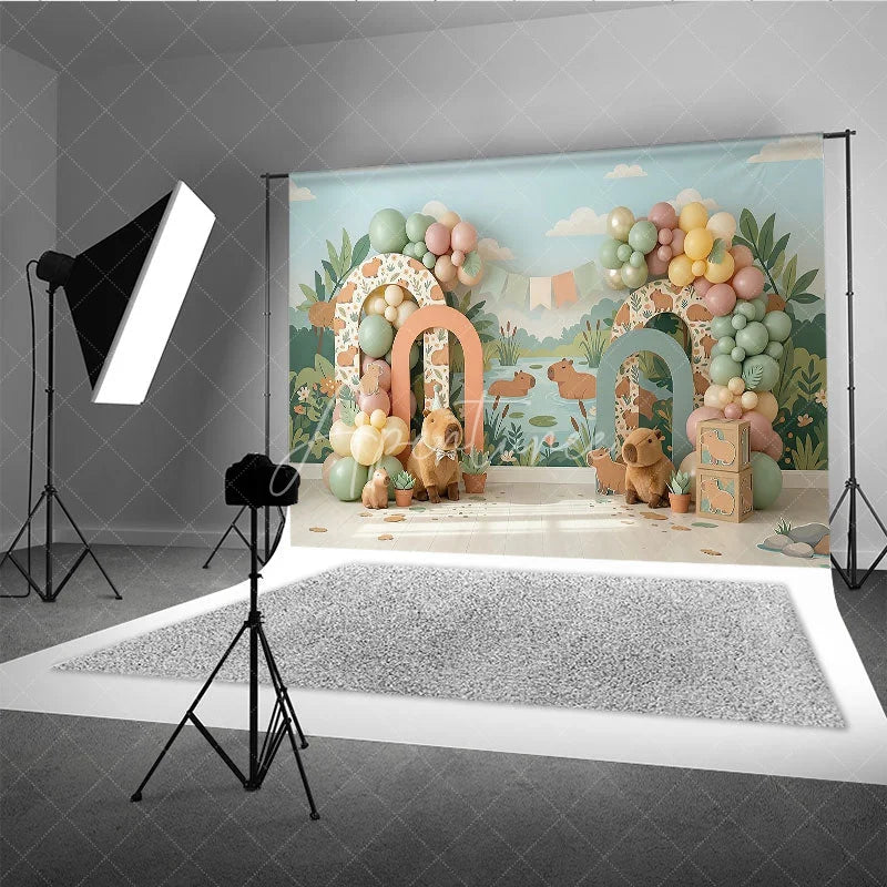 Aperturee - Aperturee Whimsical Capybara Jungle River Photography Backdrop with Pastel Balloons and Arches Birthday Baby Shower Party Decor