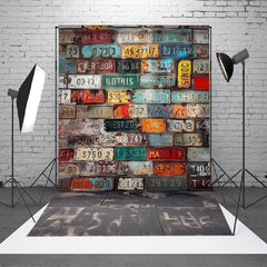 Aperturee - Colorful License Plate Brick Wall Photo Backdrop